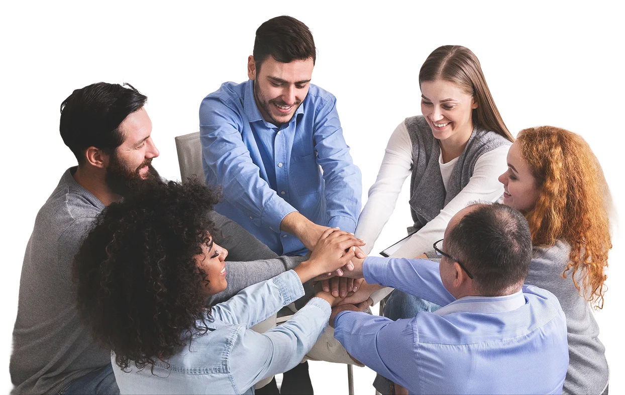 A peer support group joining hands together